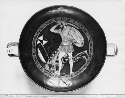 Attic red-figure cup depicting a Greek hoplite beating a fallen Persian soldier who is holding a standard, c.490 BC by Douris